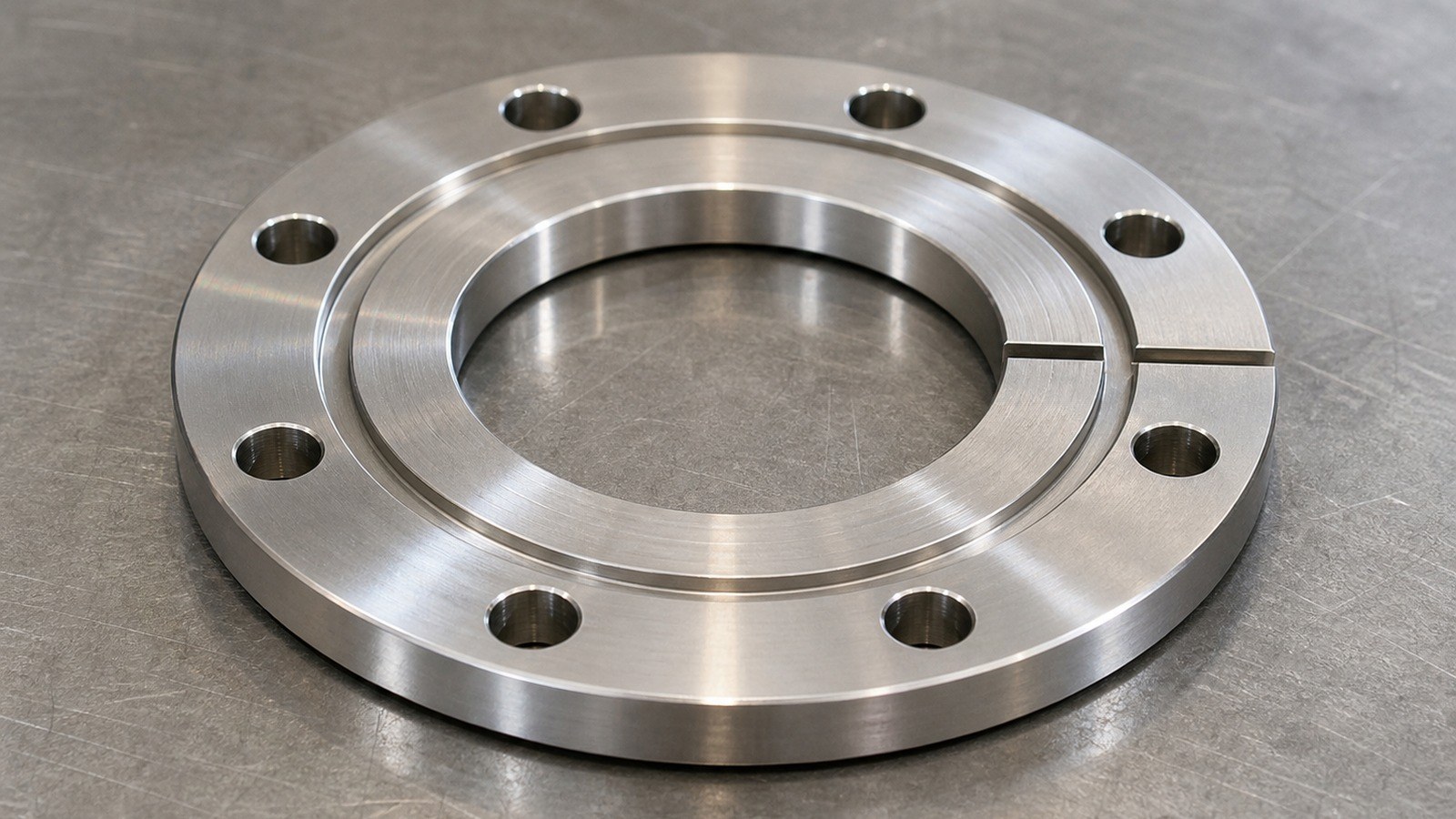 Mecanizado CNC de una brida circular de acero inoxidable para equipos de ensamblaje automatizado