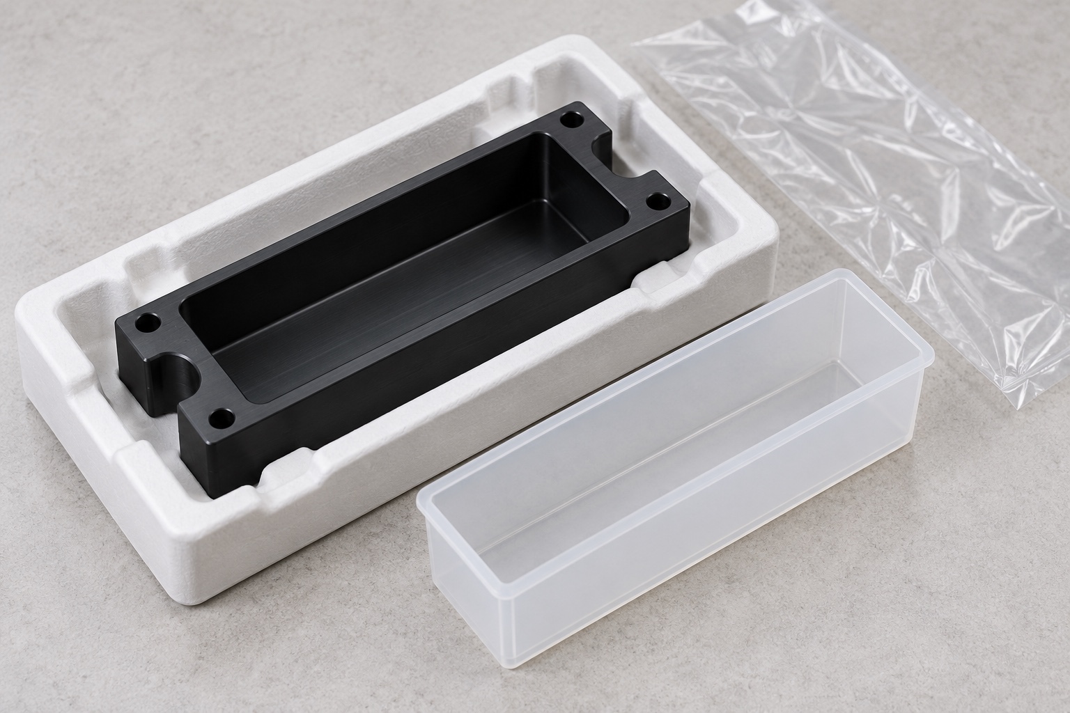 Illustrative protective packaging; not sterile delivery: Black POM Reagent Reservoir Holder: Representative CNC Manufacturing Example